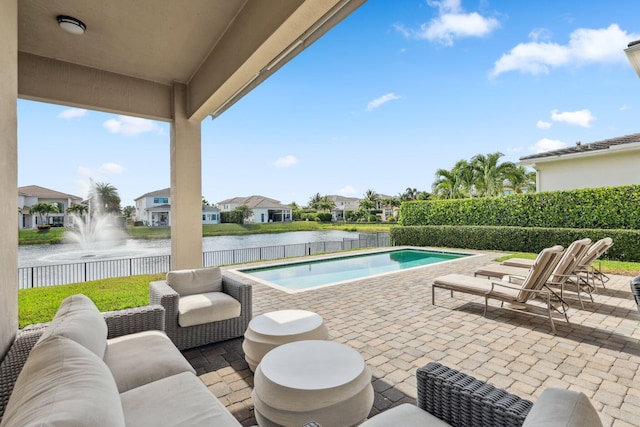 6950 NW 25th Way, Boca Raton, FL 33496 - view of patio with a water view, a residential view, a fenced backyard, and outdoor lounge area