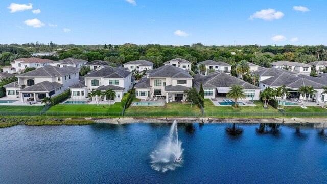 6950 NW 25th Way, Boca Raton, FL 33496 - aerial perspective of suburban area featuring a large body of water