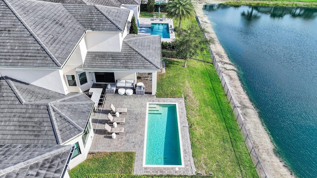 6950 NW 25th Way, Boca Raton, FL 33496 - view of subject property featuring a pool and a nearby body of water