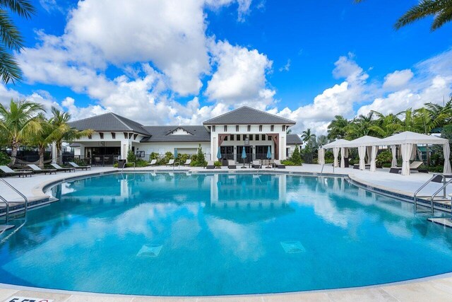 6950 NW 25th Way, Boca Raton, FL 33496 - community pool featuring a gazebo and a patio area