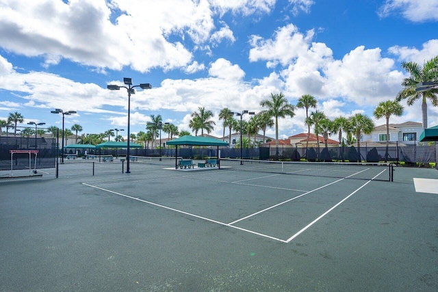 6950 NW 25th Way, Boca Raton, FL 33496 - view of tennis court featuring fence