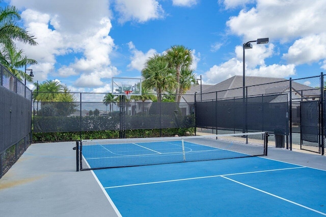 6950 NW 25th Way, Boca Raton, FL 33496 - view of tennis court with fence