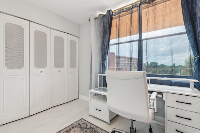 office area with marble finish floor