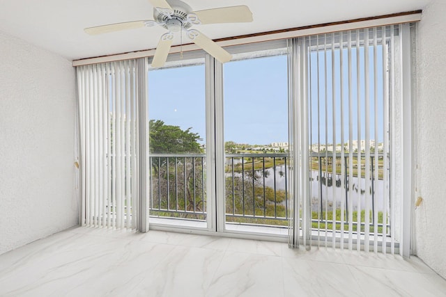 unfurnished sunroom with a water view