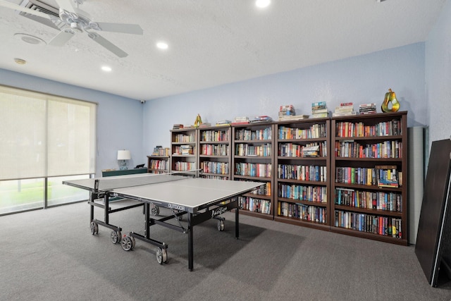 game room featuring recessed lighting, carpet flooring, a textured ceiling, and a ceiling fan