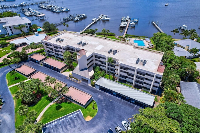 birds eye view of property featuring a water view