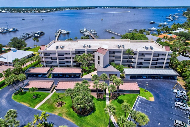 birds eye view of property featuring a water view
