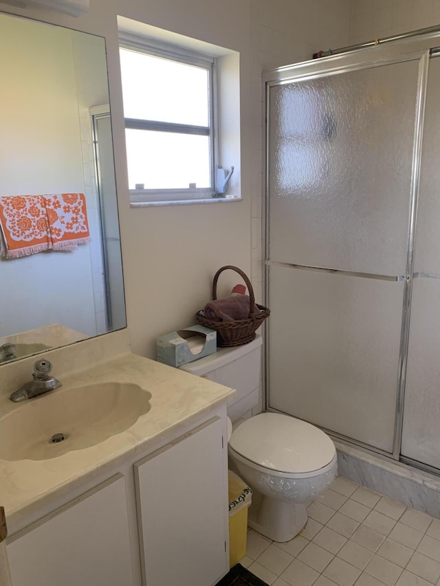 full bathroom with toilet, a stall shower, a wall mounted air conditioner, tile patterned floors, and vanity