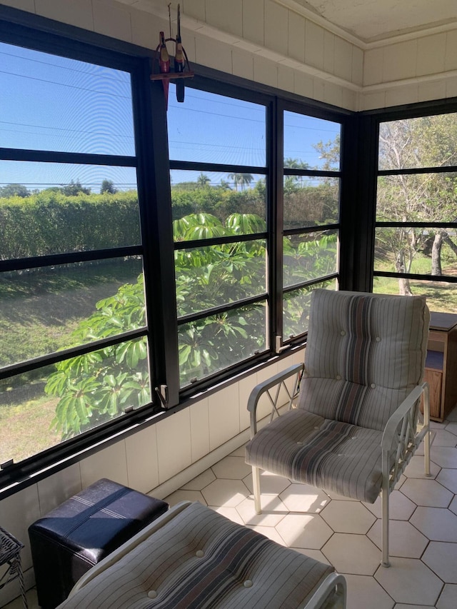 sunroom with tile patterned floors