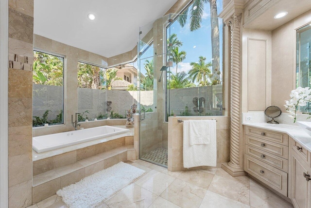 17906 Aberdeen Way, Boca Raton, FL 33496 - bathroom featuring healthy amount of natural light, a shower stall, vanity, and a garden tub