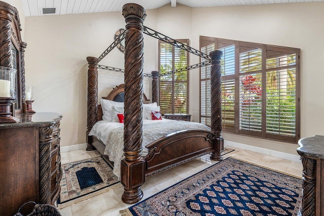 17906 Aberdeen Way, Boca Raton, FL 33496 - tiled bedroom with vaulted ceiling, multiple windows, and baseboards