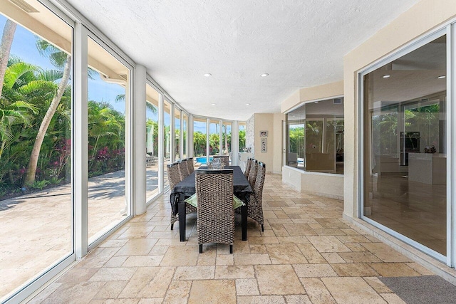 17906 Aberdeen Way, Boca Raton, FL 33496 - sunroom / solarium featuring stone tile flooring, a textured ceiling, and recessed lighting