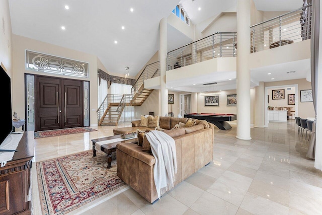 17906 Aberdeen Way, Boca Raton, FL 33496 - living room with high vaulted ceiling, stairway, pool table, decorative columns, and recessed lighting