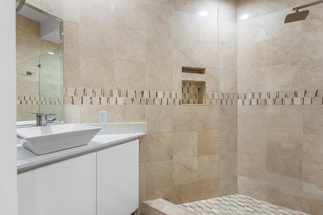 17906 Aberdeen Way, Boca Raton, FL 33496 - bathroom featuring walk in shower, vanity, and tile walls
