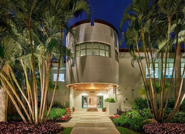 17906 Aberdeen Way, Boca Raton, FL 33496 - exterior entry at night featuring stucco siding