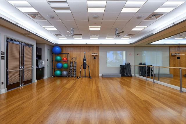 17906 Aberdeen Way, Boca Raton, FL 33496 - workout area featuring wood finished floors and a raised ceiling