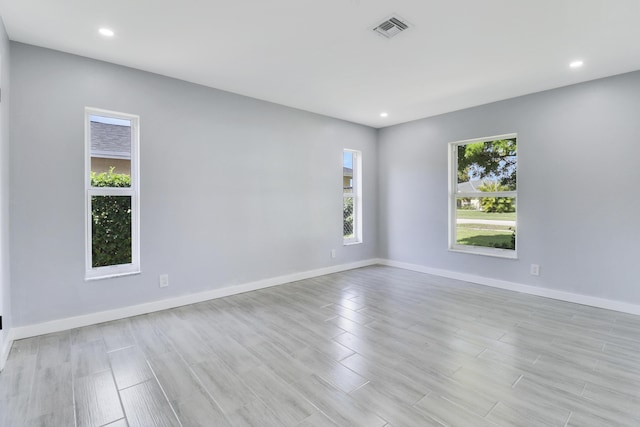 2732 Starwood Cir, West Palm Beach, FL 33406 - unfurnished room with recessed lighting, baseboards, and light wood finished floors