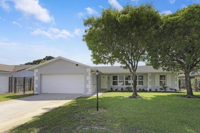 2732 Starwood Cir, West Palm Beach, FL 33406 - ranch-style home featuring a garage and driveway