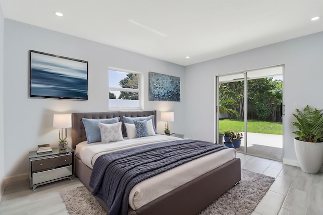 2732 Starwood Cir, West Palm Beach, FL 33406 - bedroom featuring access to outside, multiple windows, recessed lighting, and light wood-style flooring
