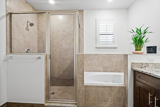 12949 Anthorne Ln, Boynton Beach, FL 33436 - bathroom with vanity, a stall shower, and a garden tub