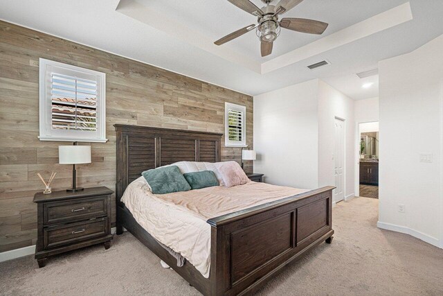 12949 Anthorne Ln, Boynton Beach, FL 33436 - bedroom featuring visible vents, a raised ceiling, baseboards, and light colored carpet