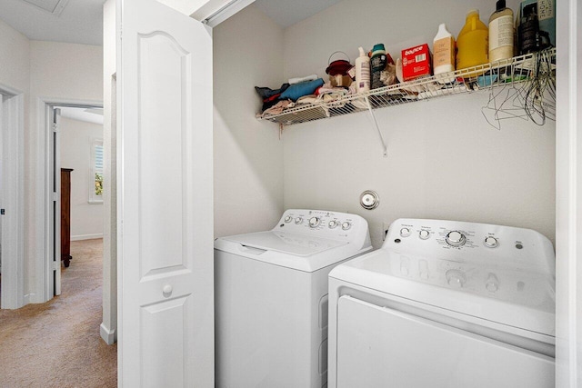 12949 Anthorne Ln, Boynton Beach, FL 33436 - washroom featuring washing machine and clothes dryer, laundry area, and light carpet