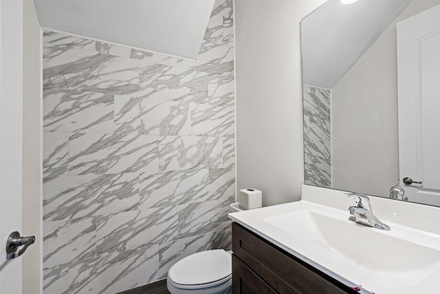 12949 Anthorne Ln, Boynton Beach, FL 33436 - half bathroom featuring vanity, marble finish floor, and toilet