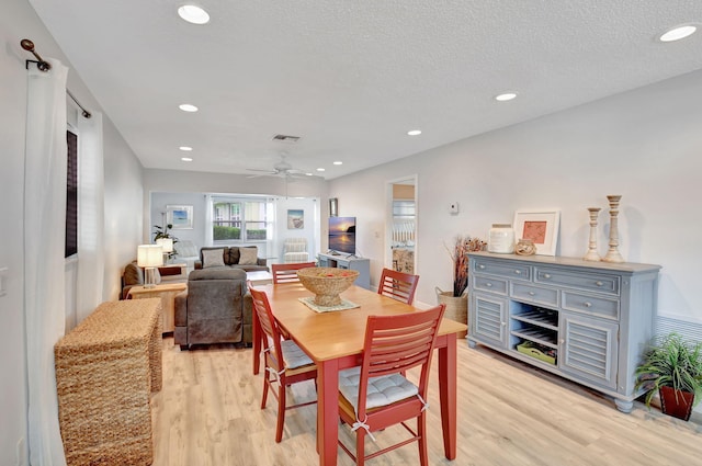 124 Mockingbird Ln Unit 124, Delray Beach, FL 33445 - dining space featuring light wood-style flooring, a ceiling fan, recessed lighting, and a textured ceiling