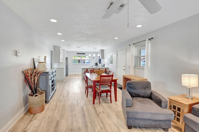 124 Mockingbird Ln Unit 124, Delray Beach, FL 33445 - dining room featuring light wood finished floors, ceiling fan, recessed lighting, and baseboards