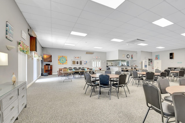 124 Mockingbird Ln Unit 124, Delray Beach, FL 33445 - dining room featuring a drop ceiling and light carpet