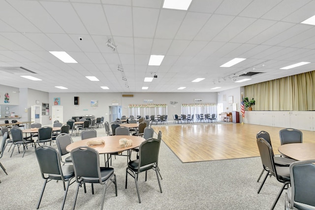 124 Mockingbird Ln Unit 124, Delray Beach, FL 33445 - dining space with a paneled ceiling and light colored carpet