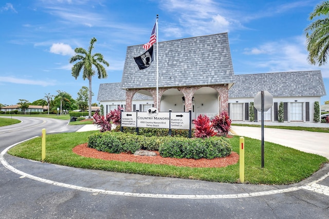 124 Mockingbird Ln Unit 124, Delray Beach, FL 33445 - surrounding community with a yard