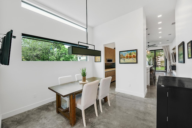 188 Yale Dr, Lake Worth Beach, FL 33460 - dining room with baseboards, ceiling fan, recessed lighting, and concrete floors
