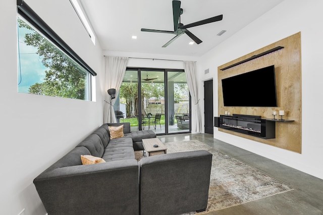 188 Yale Dr, Lake Worth Beach, FL 33460 - living room with finished concrete flooring, visible vents, and ceiling fan