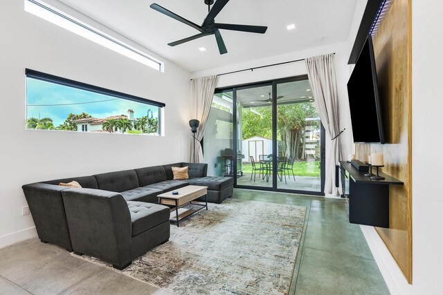 188 Yale Dr, Lake Worth Beach, FL 33460 - living area with ceiling fan, finished concrete flooring, baseboards, and recessed lighting