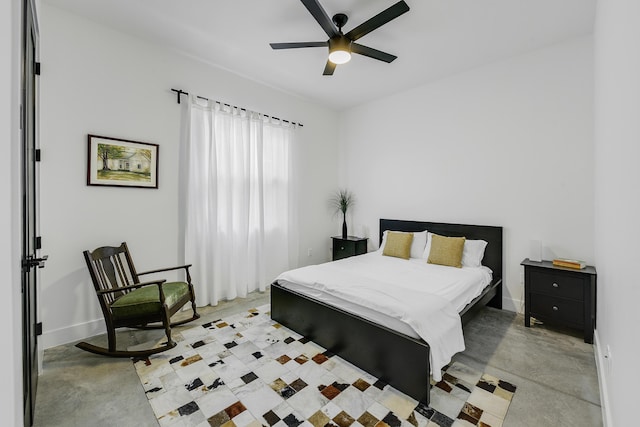 188 Yale Dr, Lake Worth Beach, FL 33460 - bedroom featuring baseboards, ceiling fan, and concrete floors