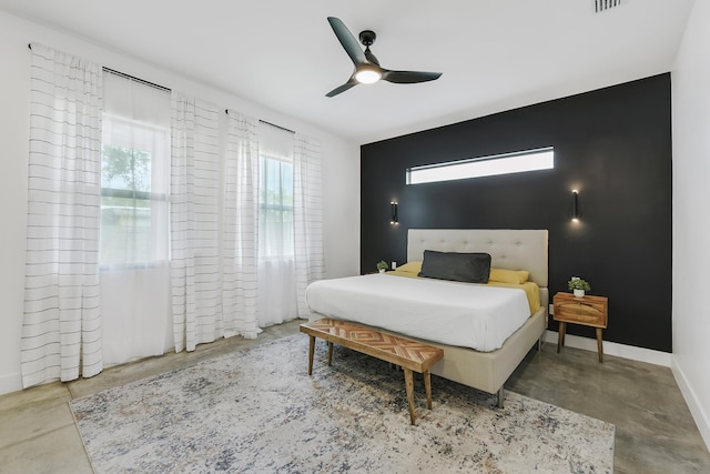 188 Yale Dr, Lake Worth Beach, FL 33460 - bedroom featuring ceiling fan, baseboards, visible vents, and concrete floors