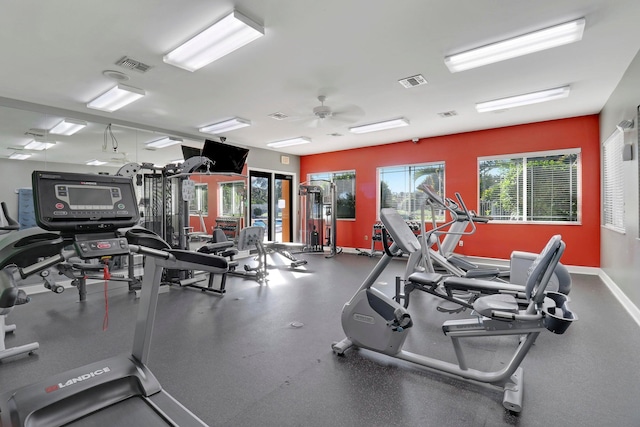 gym featuring ceiling fan and visible vents