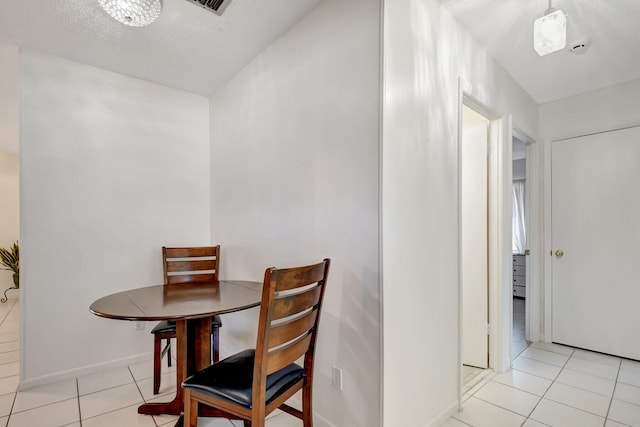 245 Bilbao St, Royal Palm Beach, FL 33411 - hallway with arched walkways, a textured ceiling, and a baseboard radiator