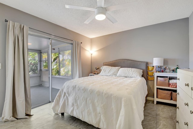 245 Bilbao St, Royal Palm Beach, FL 33411 - bedroom featuring access to outside, a textured ceiling, light marble finish flooring, and ceiling fan