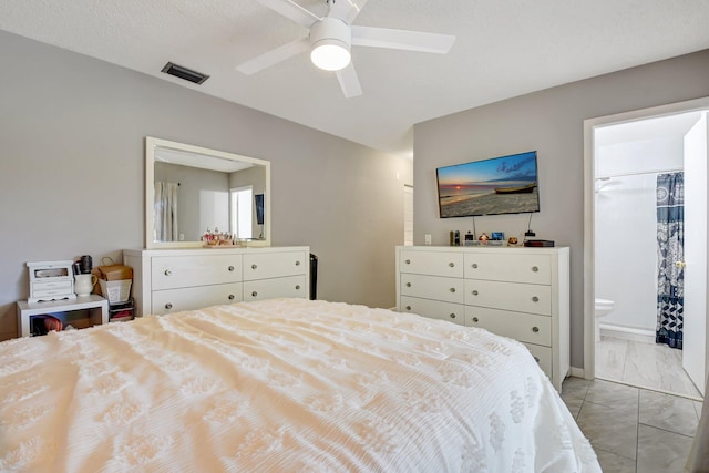 245 Bilbao St, Royal Palm Beach, FL 33411 - bedroom featuring ensuite bathroom, ceiling fan, and light marble finish flooring