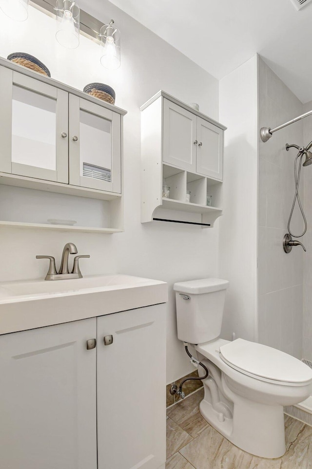 245 Bilbao St, Royal Palm Beach, FL 33411 - full bath featuring toilet, vanity, and tiled shower