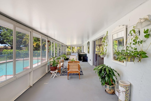 245 Bilbao St, Royal Palm Beach, FL 33411 - sunroom / solarium featuring concrete flooring, outdoor lounge area, and plenty of natural light