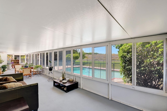 245 Bilbao St, Royal Palm Beach, FL 33411 - sunroom featuring outdoor lounge area and concrete floors