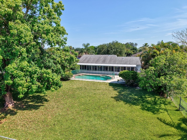 245 Bilbao St, Royal Palm Beach, FL 33411 - outdoor pool featuring a sunroom