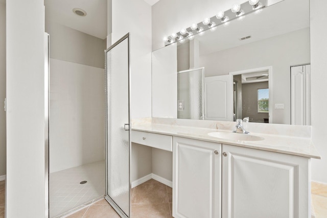 9943 SW Stonegate Dr, Port Saint Lucie, FL 34987 - full bath featuring a stall shower, tile patterned flooring, and vanity