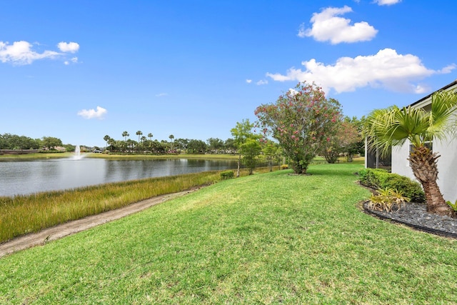 9943 SW Stonegate Dr, Port Saint Lucie, FL 34987 - view of grassy yard featuring a water view