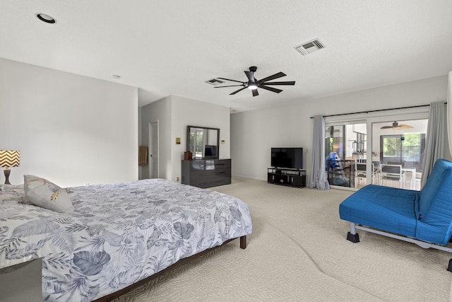 bedroom featuring ceiling fan, carpet, visible vents, and access to exterior