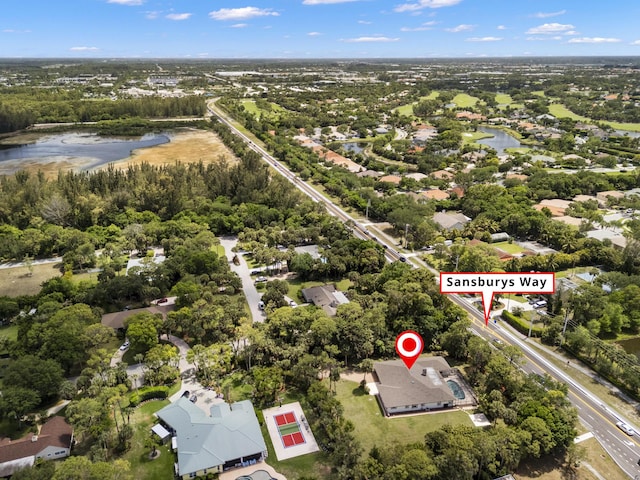 8785 Thousand Pines Cir, West Palm Beach, FL 33411 - aerial view of property's location with a tree filled landscape and nearby suburban area