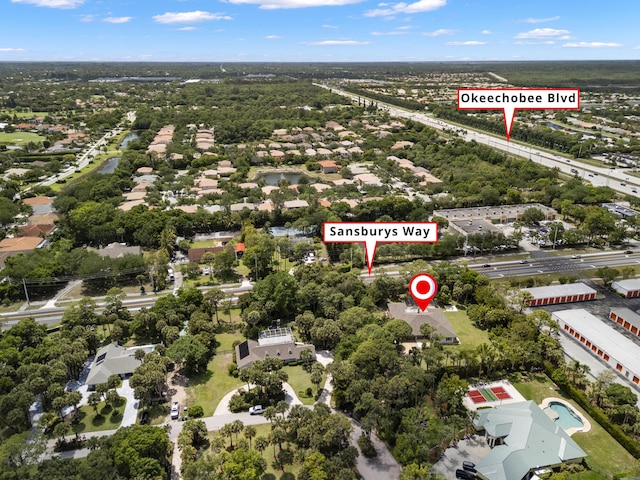 aerial overview of property's location featuring nearby suburban area